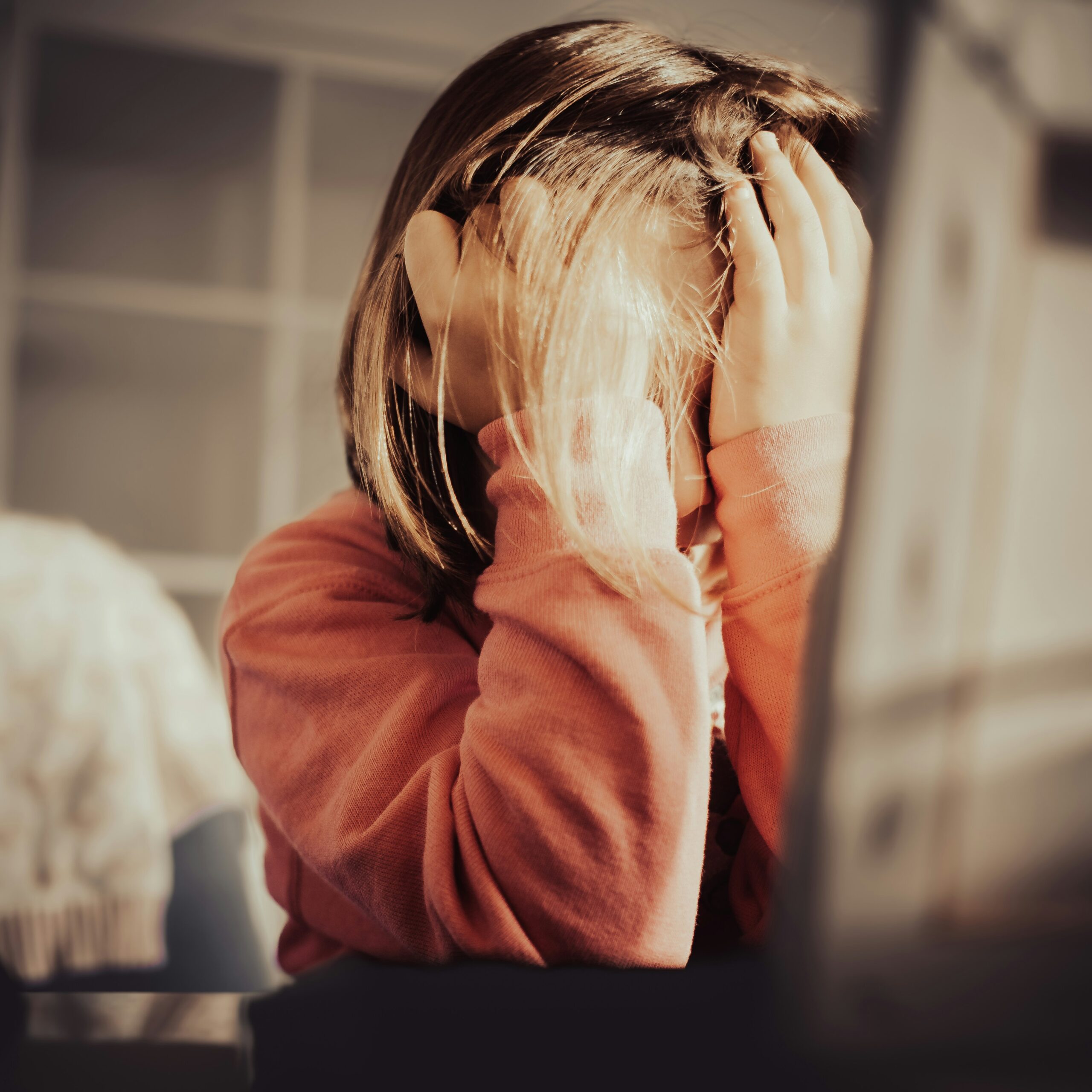 Consultant paediatrician assessing a child's injury, recovery and long-term needs for an independent report